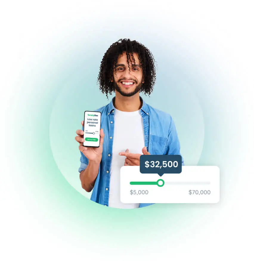 A man smiling as he holds up his phone, beside the control used to choose a loan amount.